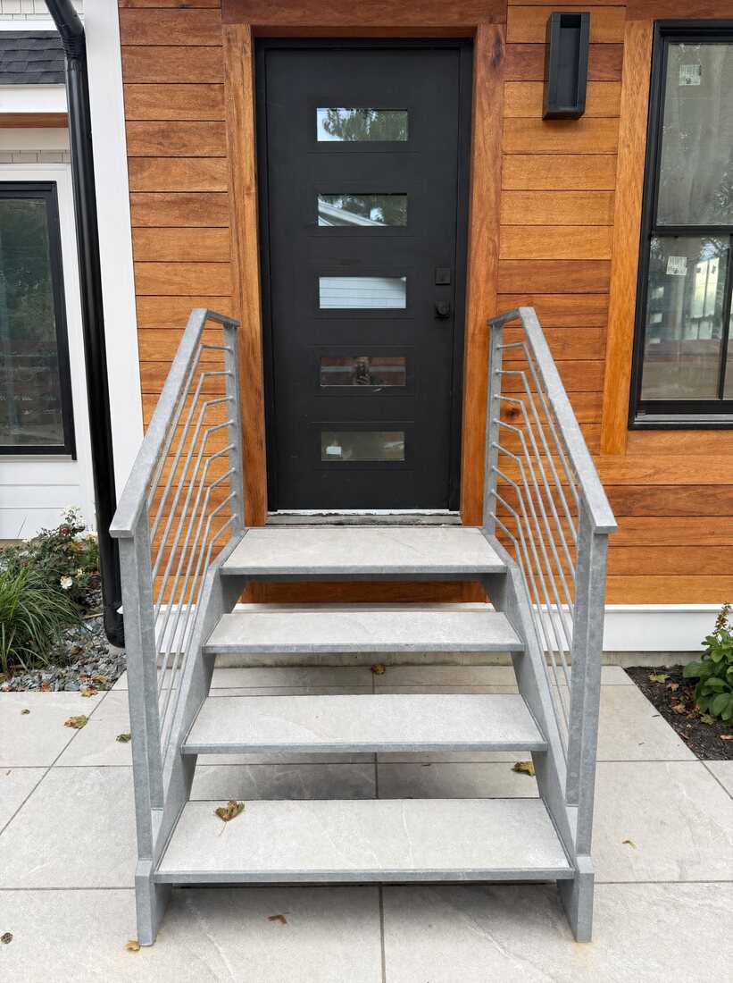 Floating exterior staircase in a hot-dip galvanized finish