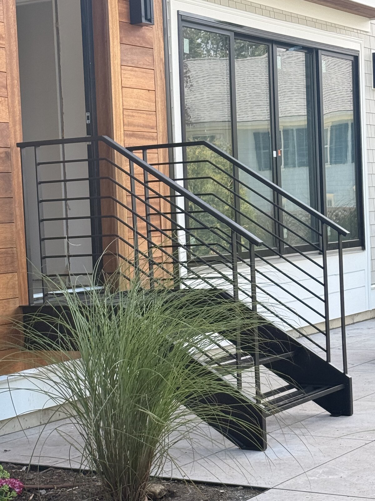 Steel frame and railing installed before treads